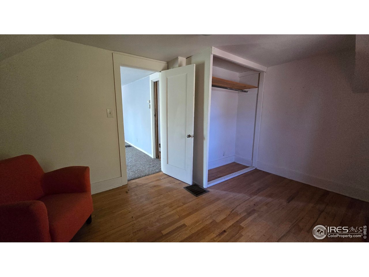 323 North 4th Street Sterling, CO 80751 - Photo 16 of 23 a black and white photo of a living room