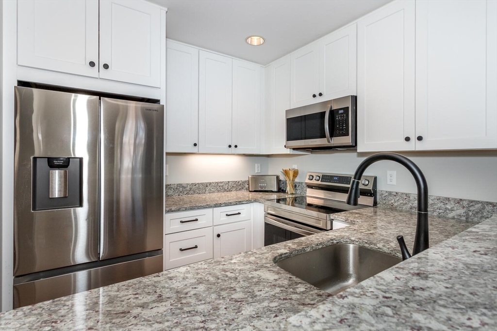 1241-1251 Adams Street, Unit F407 Boston, MA 02124 - Photo 2 of 13