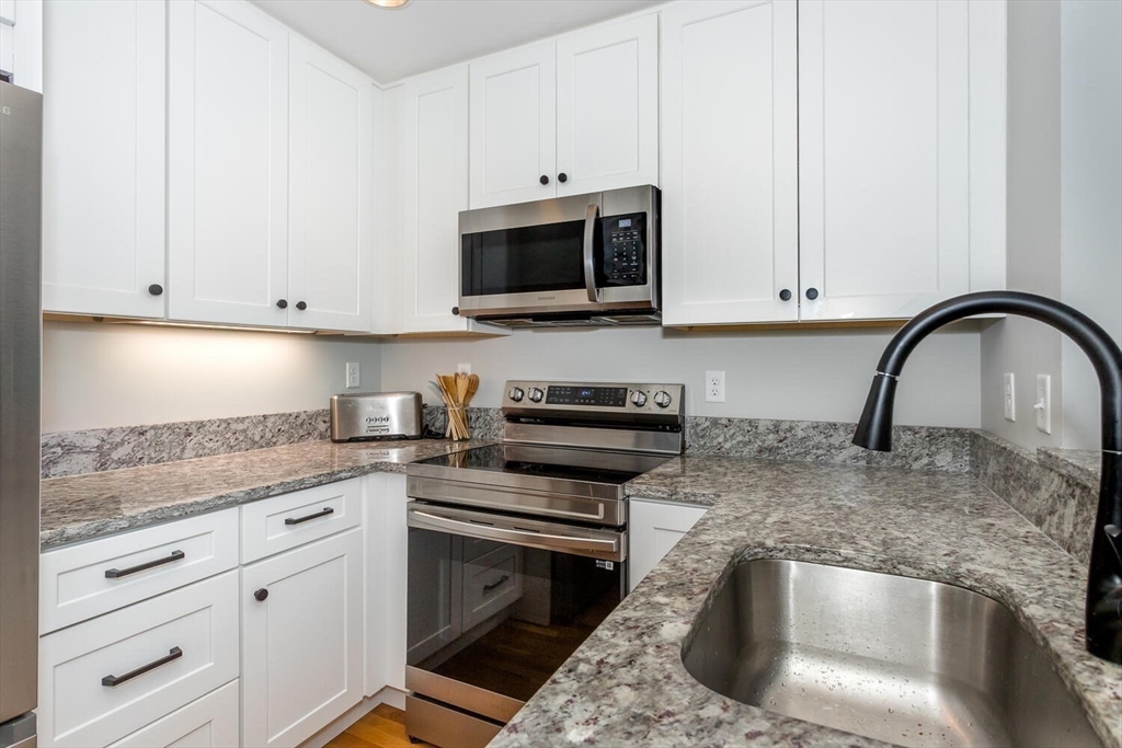 1241-1251 Adams Street, Unit F407 Boston, MA 02124 - Photo 3 of 13