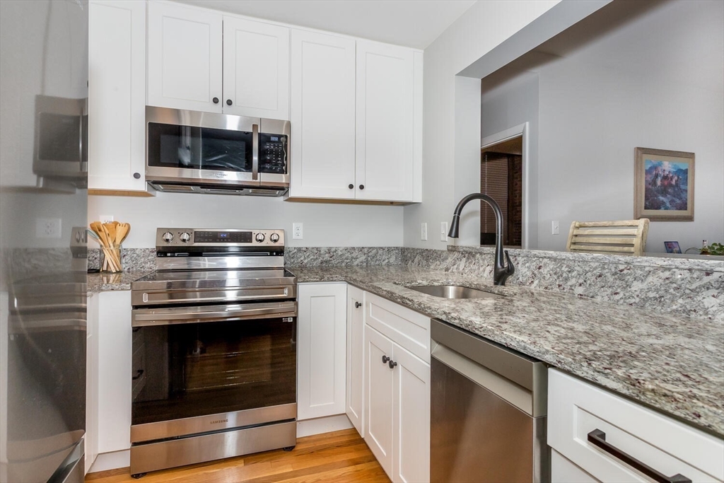 1241-1251 Adams Street, Unit F407 Boston, MA 02124 - Photo 4 of 13