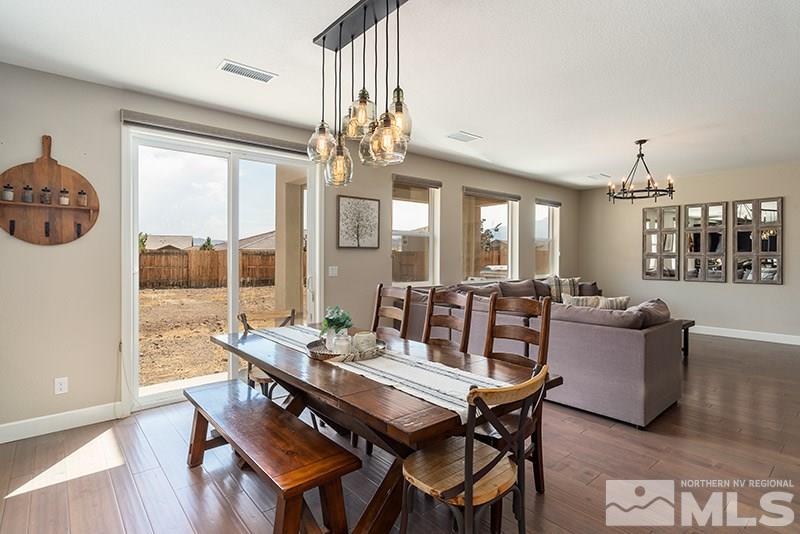 2785 Tobiano Drive Reno, NV 89521 - Photo 8 of 27 a view of a dining room with furniture window and outside view