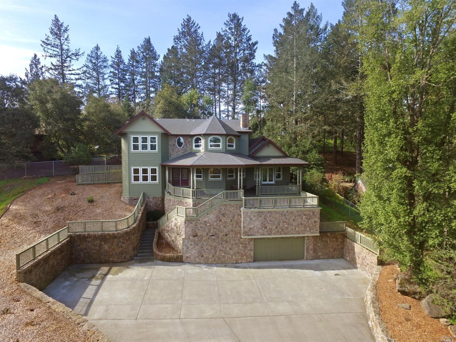 259 Brush Creek Road Santa Rosa, CA 95404 - Photo 1 of 1 a front view of a house with trees