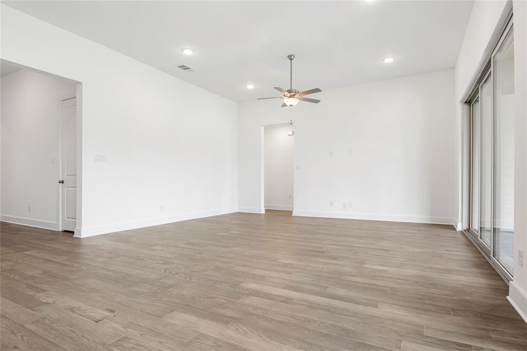 2900 Barbary Road McKinney, TX 75071 - Photo 17 of 36 Spacious living area featuring wood-finish flooring, recessed lighting, and a ceiling fan