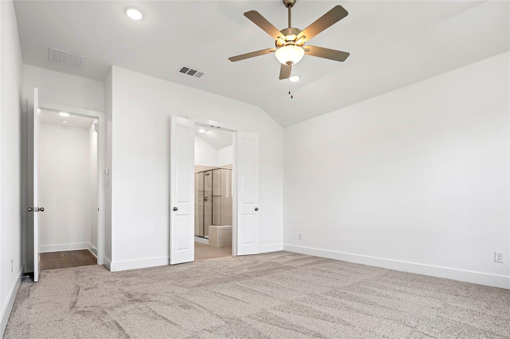 2900 Barbary Road McKinney, TX 75071 - Photo 22 of 36 Carpeted room featuring a ceiling fan with integrated lighting, recessed lighting, and a vaulted ceiling