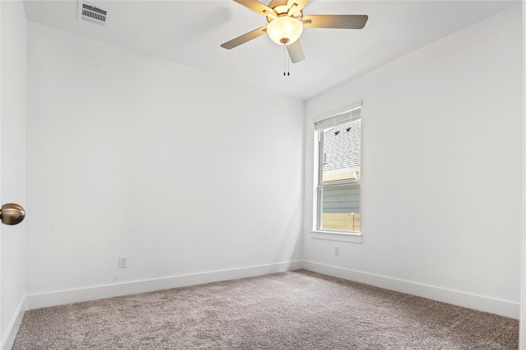 2900 Barbary Road McKinney, TX 75071 - Photo 31 of 36 Carpeted room with a ceiling fan light fixture, single window, and white walls