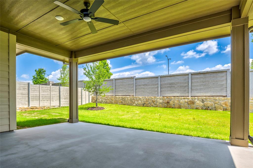 2900 Barbary Road McKinney, TX 75071 - Photo 36 of 36 Covered patio featuring a ceiling fan with integrated lighting, concrete flooring, and a flat panel ceiling