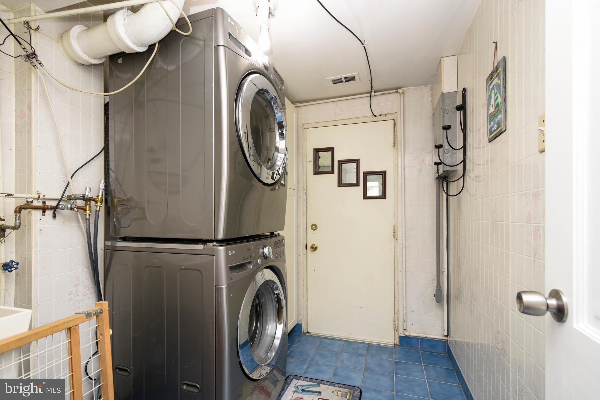 11604 Stevens Road Philadelphia, PA 19116 - Photo 21 of 33 Laundry room leads to sun-room and back yard