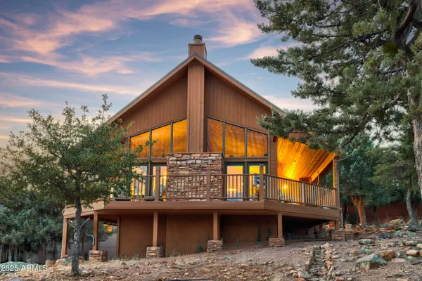 a view of a house with a iron stairs