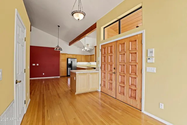 a view of an empty room with a window