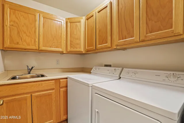 a view of a two chairs in the roof deck