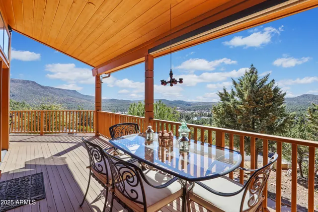 a view of a city with lush green forest
