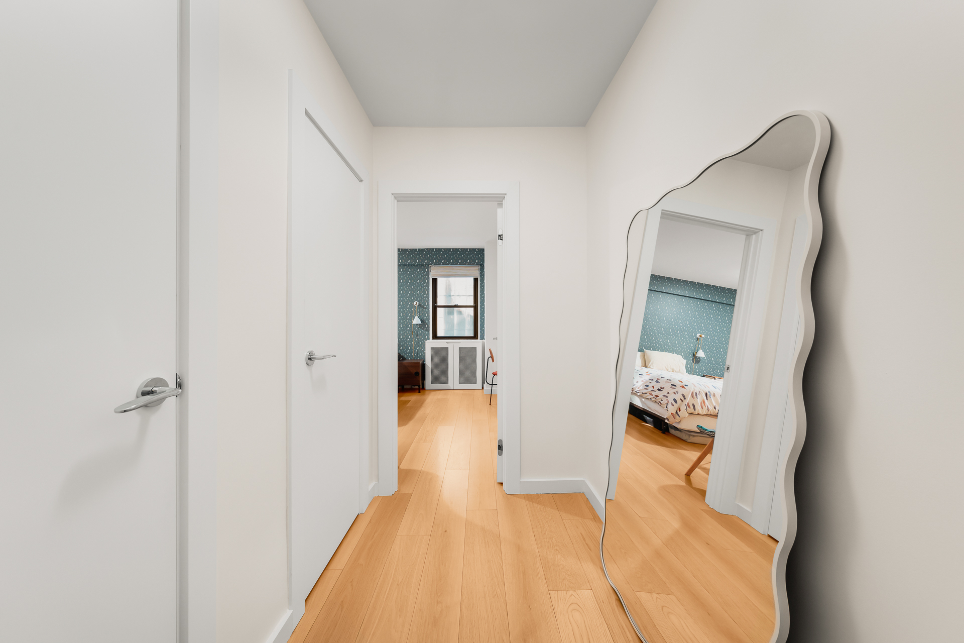 176 East 77th Street, Unit 5E Manhattan, NY 10075 - Photo 6 of 11 a view of a bedroom from a hallway