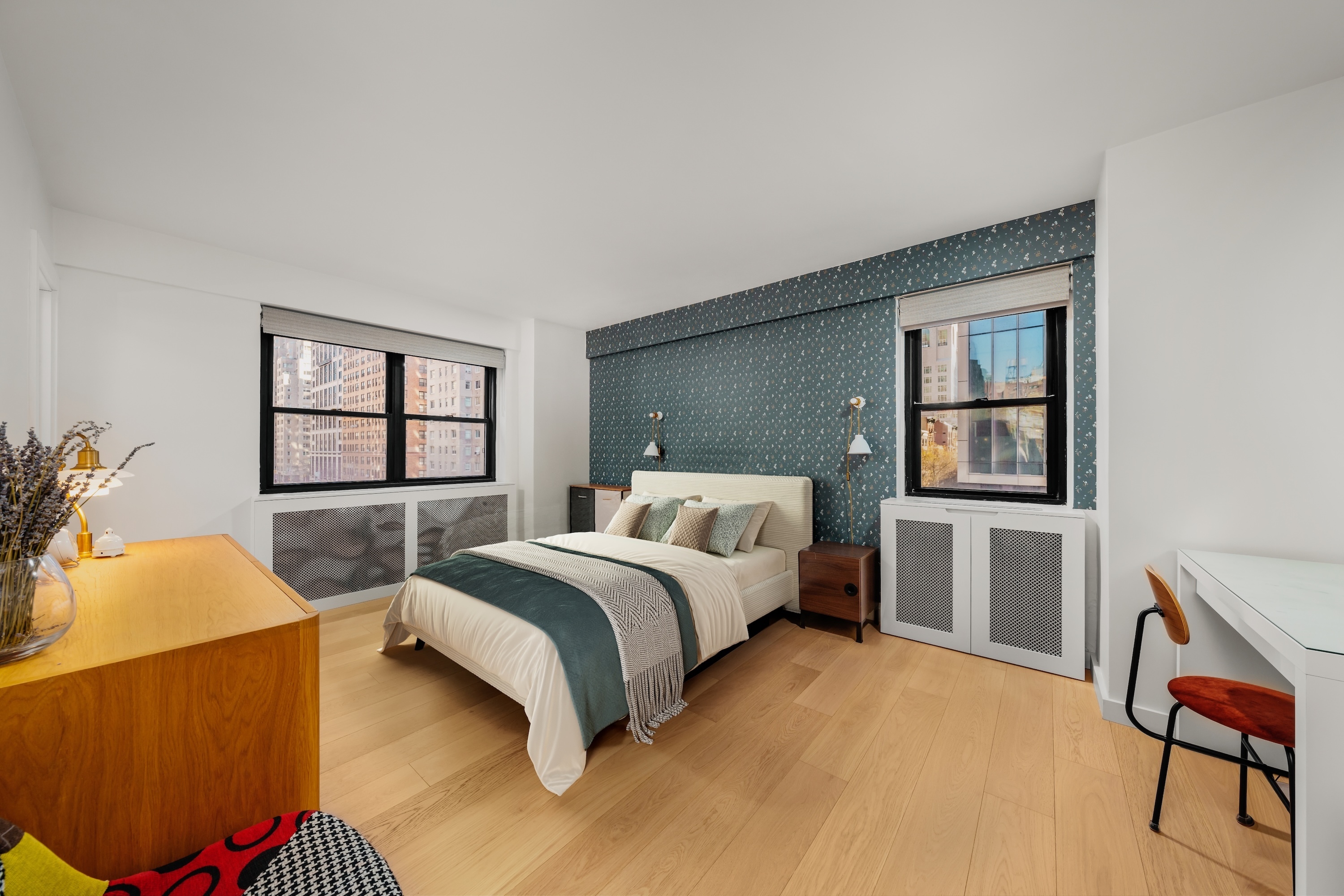 176 East 77th Street, Unit 5E Manhattan, NY 10075 - Photo 7 of 11 a bedroom with a bed and window