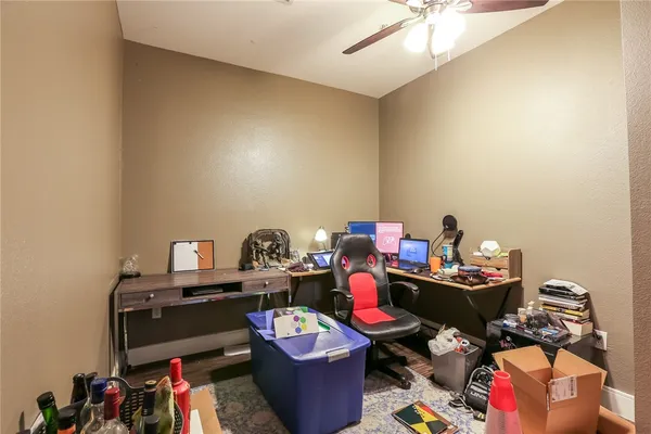 a room with furniture toys and wooden floor