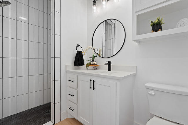 823 13th Street Wolfforth, TX 79382 - Photo 20 of 32 a bathroom with a sink and a mirror