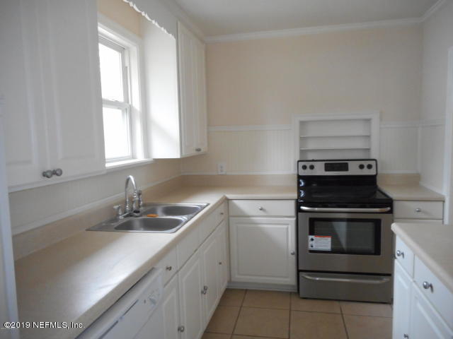 1774 Mayfair Road Jacksonville, FL 32207 - Photo 3 of 8 a kitchen with a sink stove and window