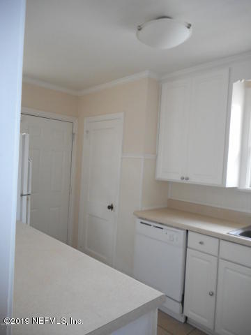 1774 Mayfair Road Jacksonville, FL 32207 - Photo 4 of 8 a room with cabinets