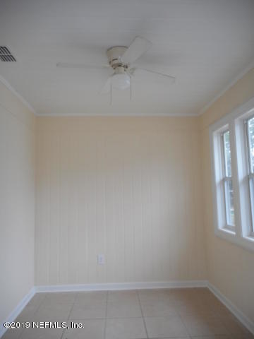 1774 Mayfair Road Jacksonville, FL 32207 - Photo 6 of 8 a bathroom with a bathtub