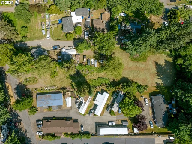 a backyard of a house with lots of green space
