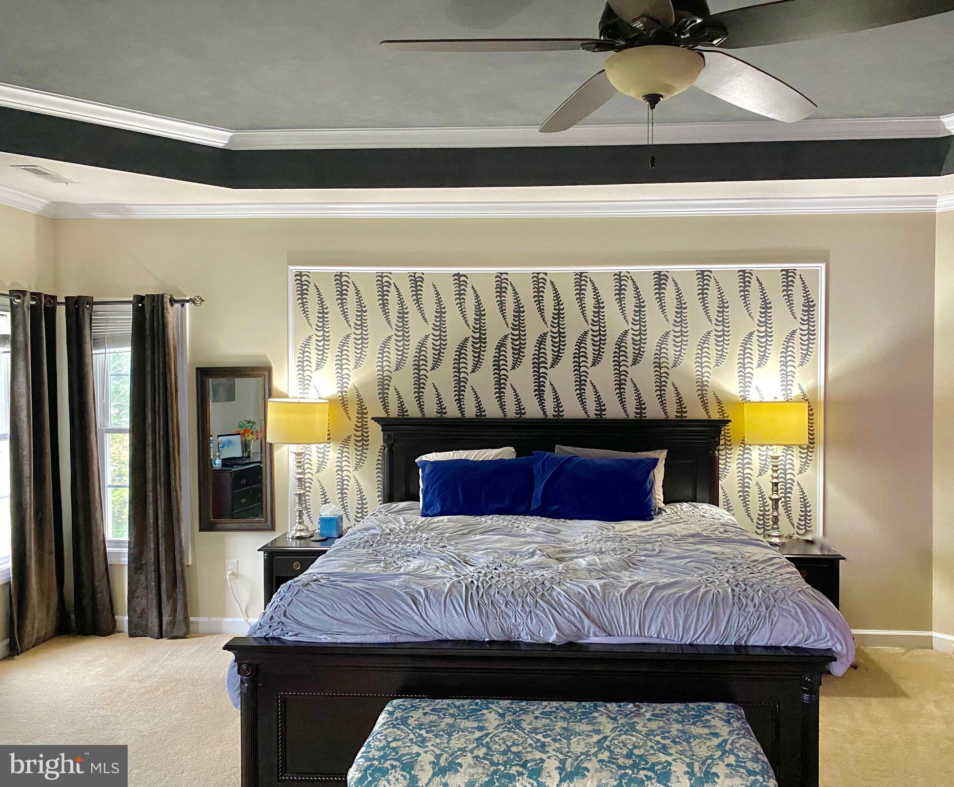 10838 Catron Road Perry Hall, MD 21128 - Photo 20 of 44 Large primary bedroom with accent wall and drapes