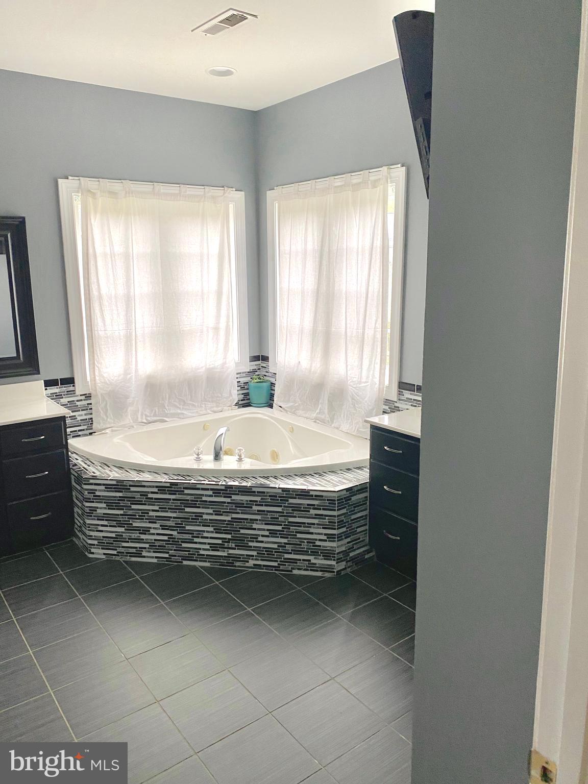 10838 Catron Road Perry Hall, MD 21128 - Photo 24 of 44 Large Jacuzzi tub with separate sinks