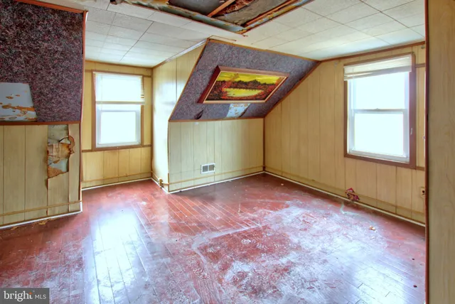 an empty room with windows