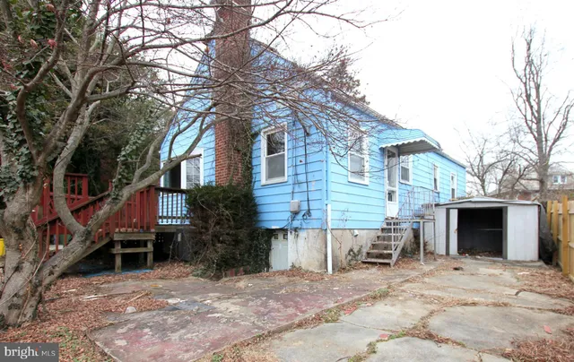 a backyard of a house with seating space