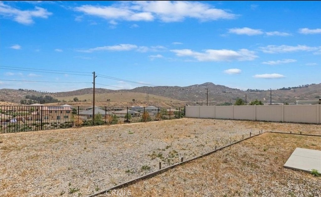21288 Telegraph Road Riverside, CA 92507 - Photo 16 of 23 a view of a dry yard with mountain