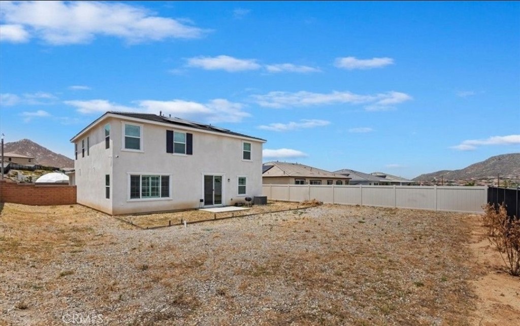 21288 Telegraph Road Riverside, CA 92507 - Photo 21 of 23 a view of a house with a yard