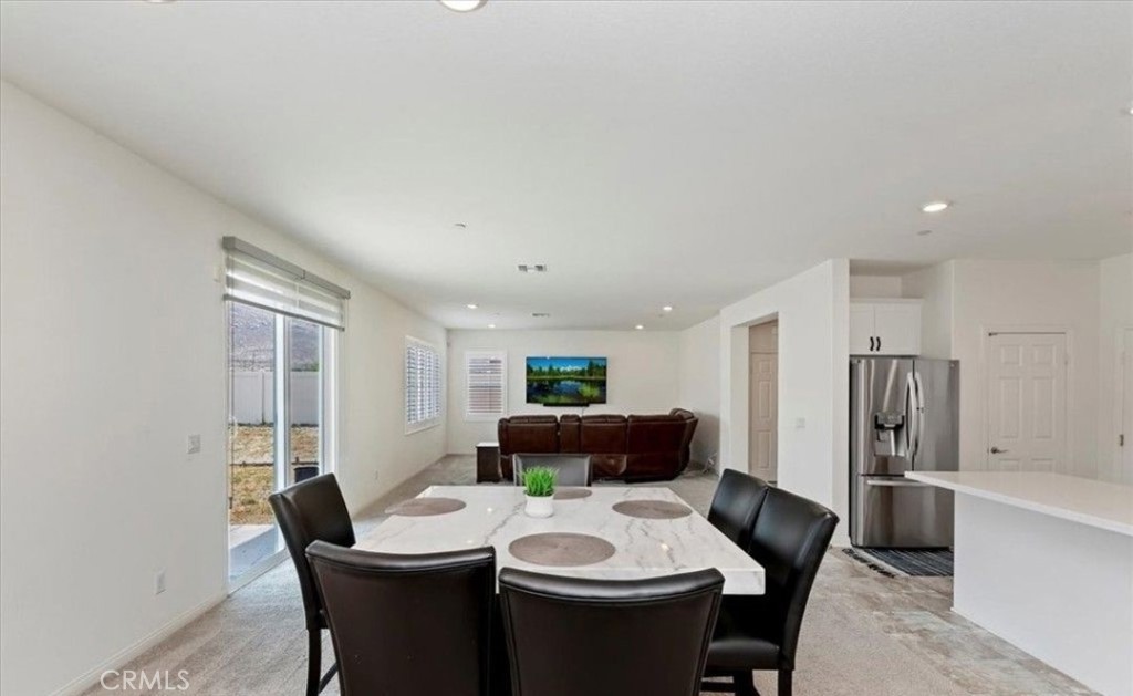 21288 Telegraph Road Riverside, CA 92507 - Photo 4 of 23 a view of a dining room with furniture