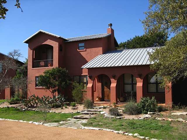 12809 Winding Creek Road Austin, TX 78736 - Photo 1 of 1 front view of a house with a yard