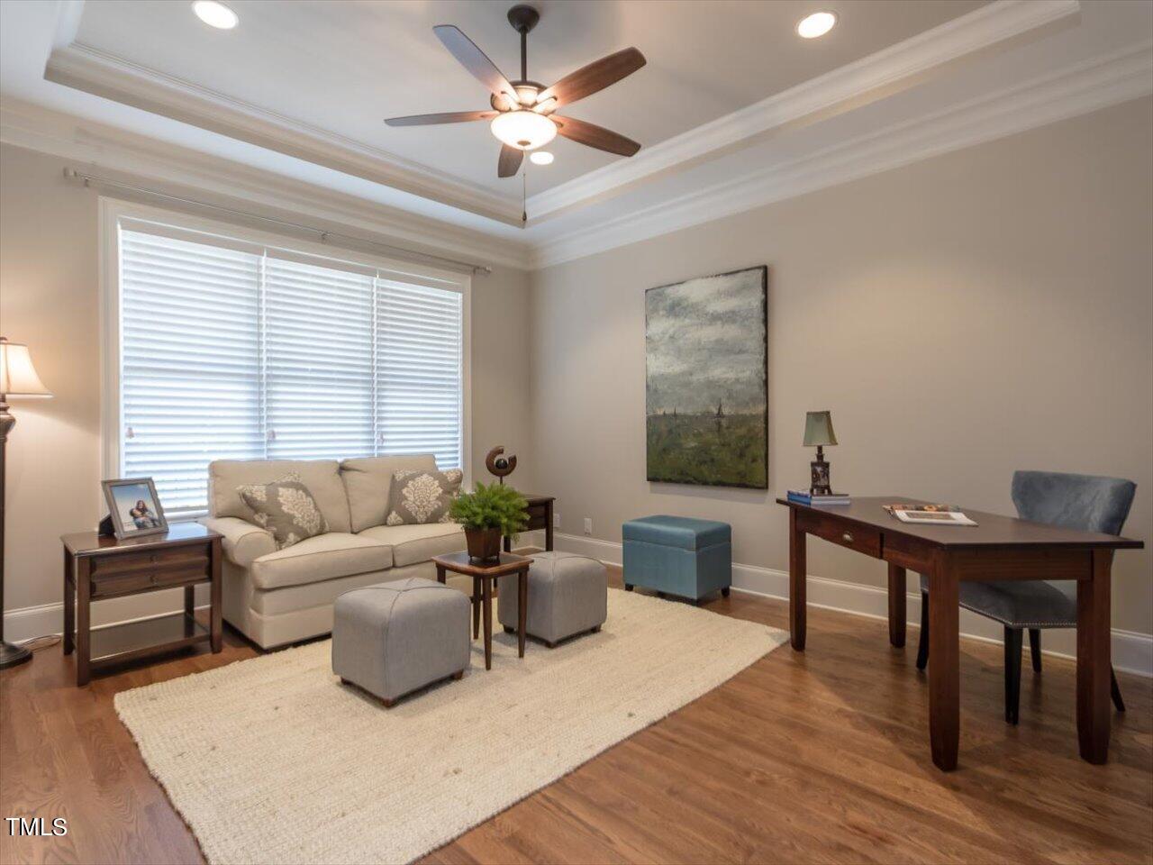 3105 Colmar Manor Drive Cary, NC 27519 - Photo 11 of 61 a living room with furniture and windows