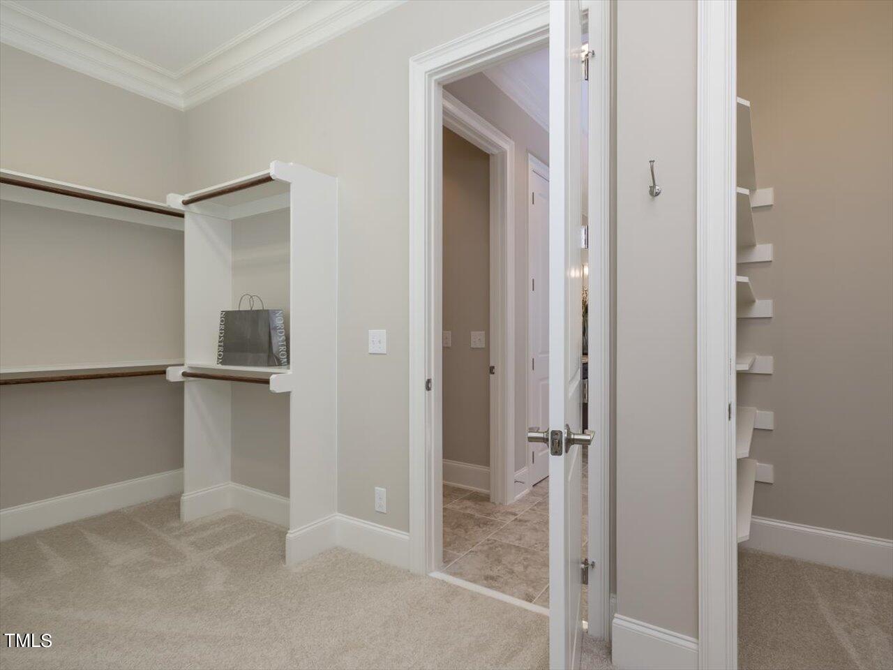 3105 Colmar Manor Drive Cary, NC 27519 - Photo 26 of 61 Primary Walk-in Closet showing Safe Room