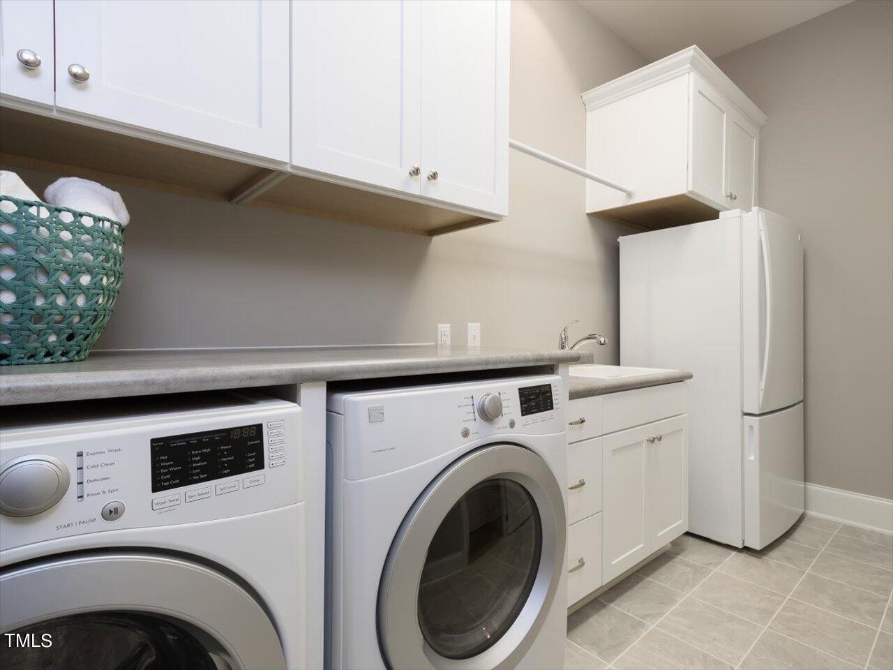3105 Colmar Manor Drive Cary, NC 27519 - Photo 31 of 61 Laundry Counter Top folding & 2nd Fridge