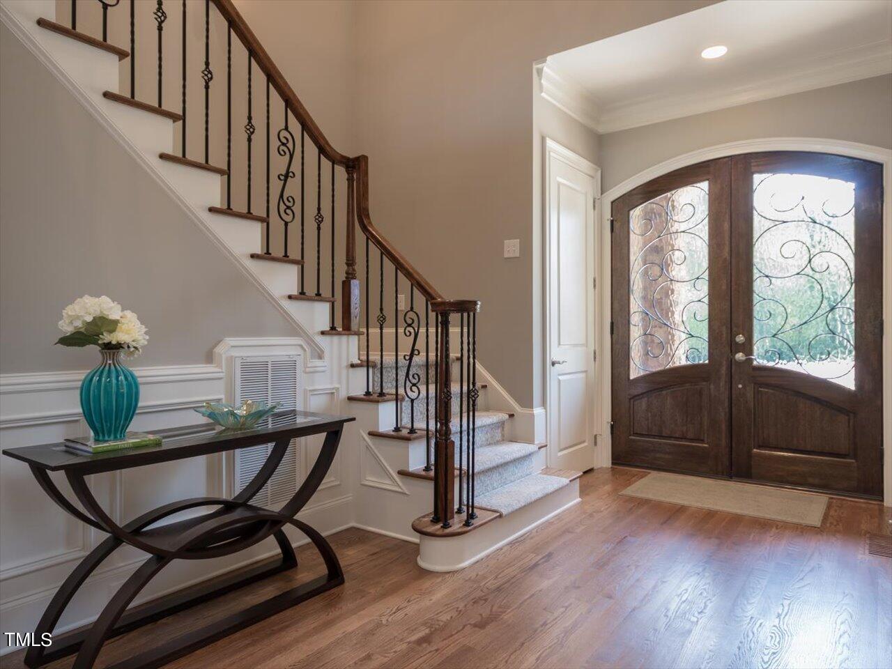 3105 Colmar Manor Drive Cary, NC 27519 - Photo 5 of 61 a view of a livingroom with furniture wooden floor and windows