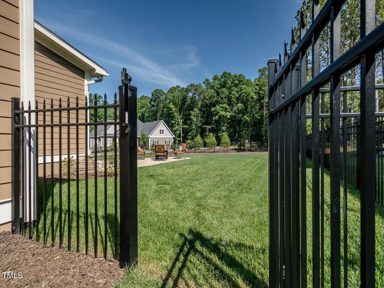 3105 Colmar Manor Drive Cary, NC 27519 - Photo 58 of 61 a view of backyard from window