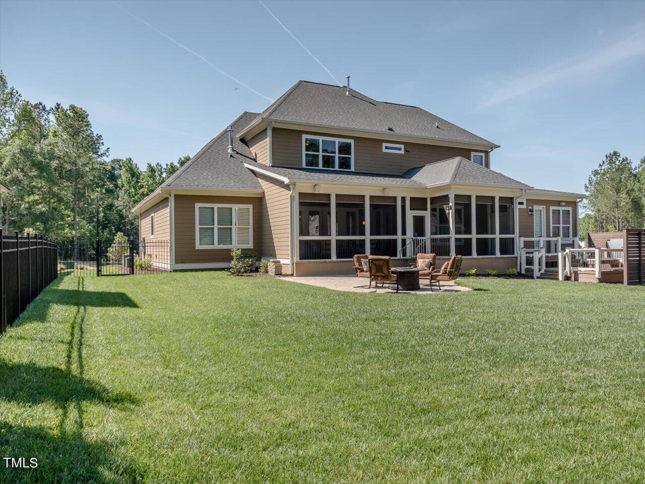 3105 Colmar Manor Drive Cary, NC 27519 - Photo 59 of 61 a front view of a house with a garden