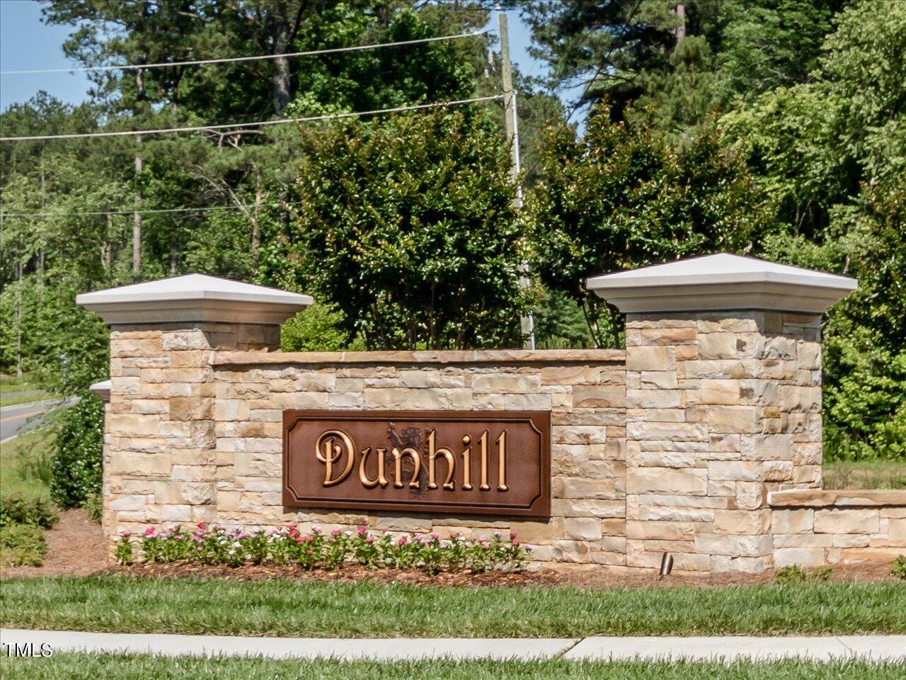 3105 Colmar Manor Drive Cary, NC 27519 - Photo 60 of 61 a view of outdoor space with signage and flags