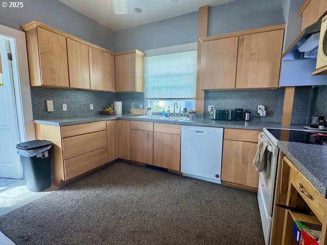 904 Penn Avenue La Grande, OR 97850 - Photo 11 of 46 a kitchen with a sink a stove and cabinets