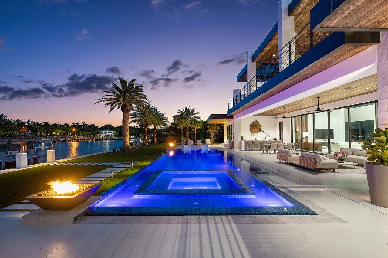 4460 Northeast 31st Avenue Lighthouse Point, FL 33064 - Photo 144 of 152 a view of swimming pool with outdoor seating