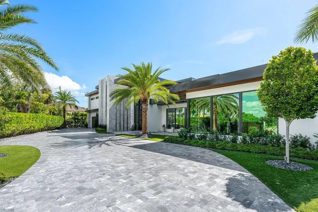 an aerial view of a house with outdoor space swimming pool and outdoor seating