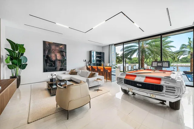 a spacious bathroom with a double vanity sink a mirror and a shower