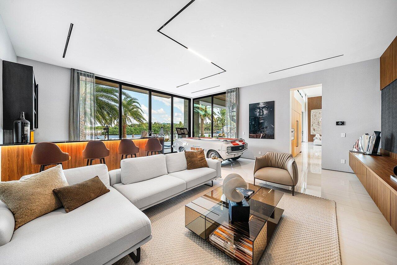 4460 Northeast 31st Avenue Lighthouse Point, FL 33064 - Photo 29 of 152 a living room with furniture and a large window