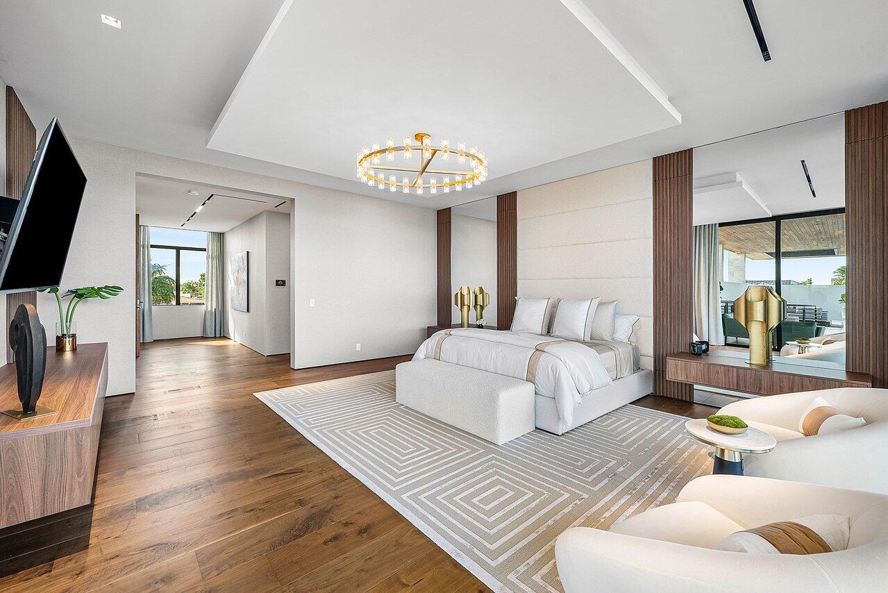 4460 Northeast 31st Avenue Lighthouse Point, FL 33064 - Photo 38 of 152 a bedroom with furniture and a large window