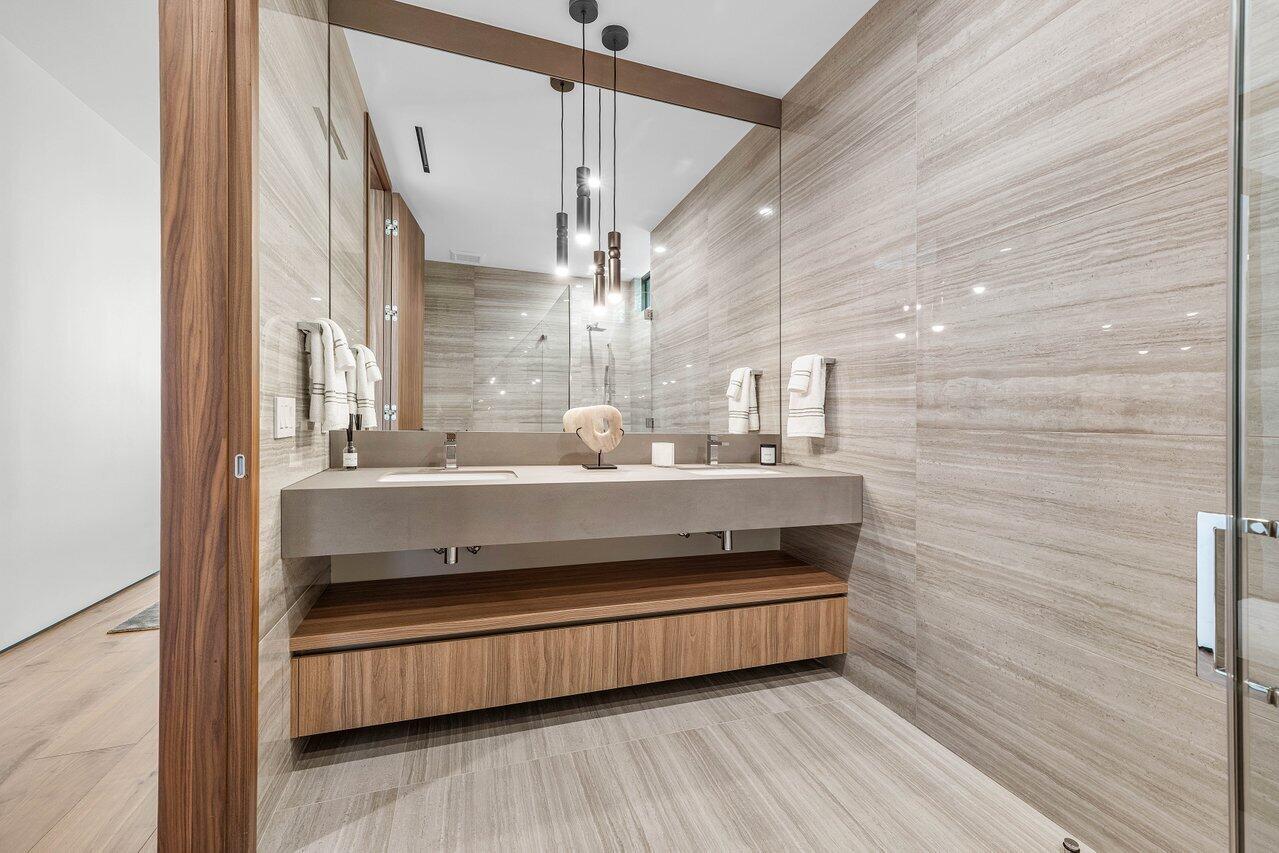 4460 Northeast 31st Avenue Lighthouse Point, FL 33064 - Photo 65 of 152 a view of hall way with wooden floor and staircase