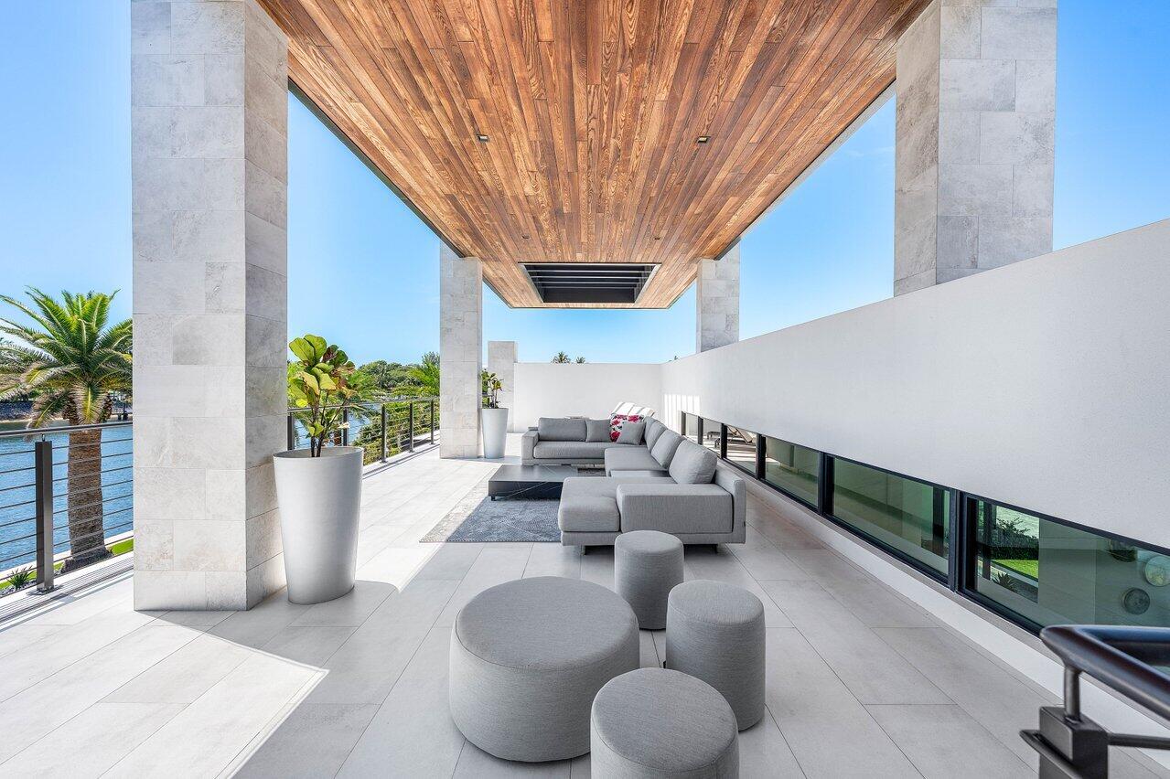 4460 Northeast 31st Avenue Lighthouse Point, FL 33064 - Photo 79 of 152 a view of entryway and hall with wooden floor