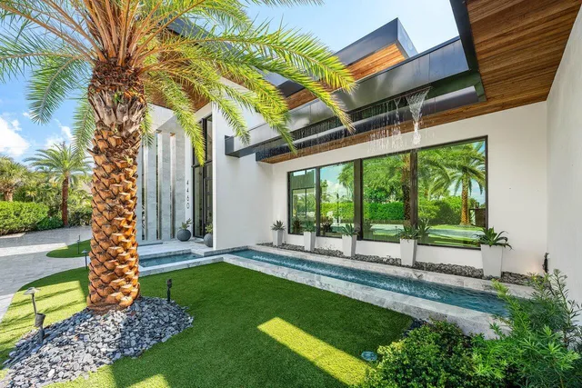 a outdoor living space with furniture and garden view