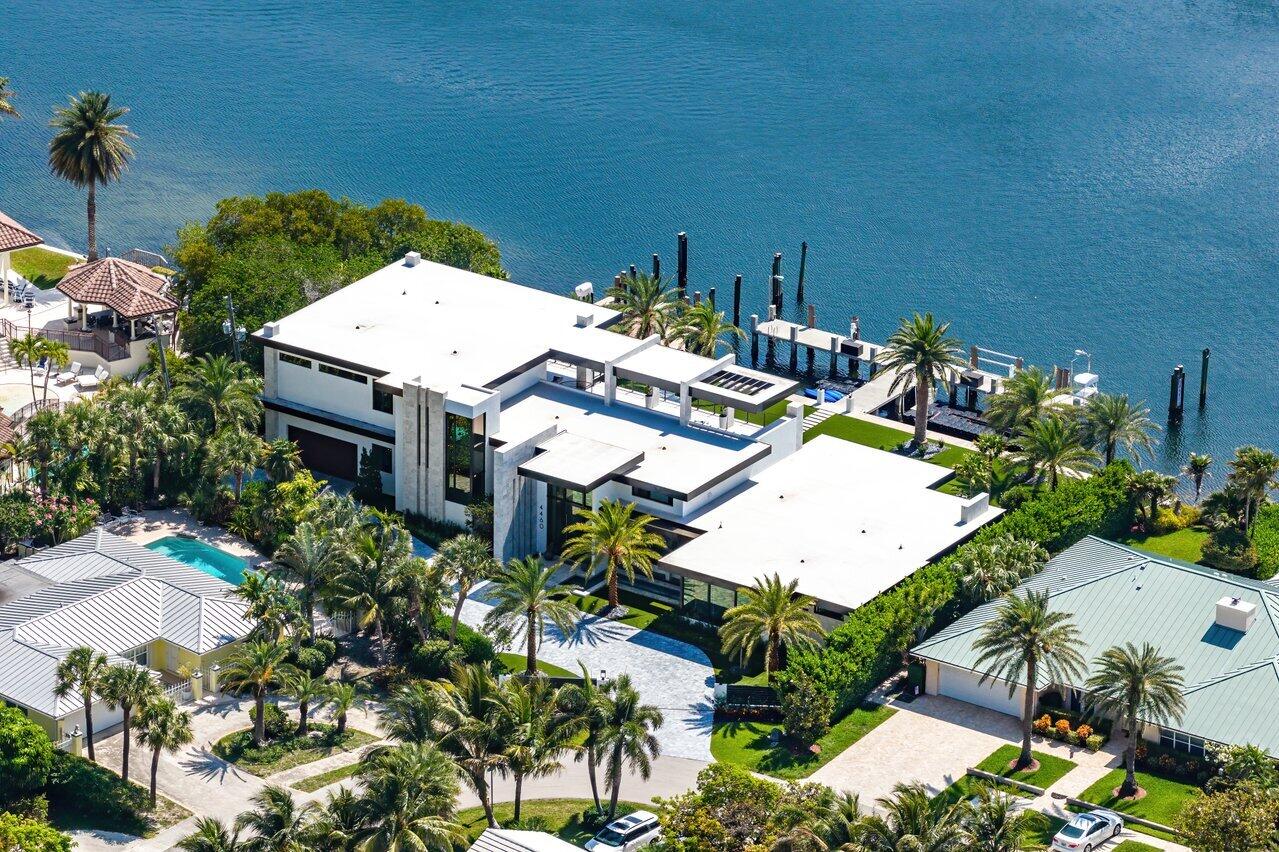 4460 Northeast 31st Avenue Lighthouse Point, FL 33064 - Photo 97 of 152 an aerial view of a house with a yard and seating space