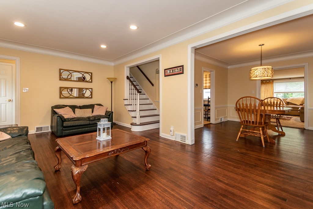 2219 Fenwick Road Cleveland, OH 44118 - Photo 2 of 32 Spacious living room is open to dining room both having gorgeous hardwood floors.