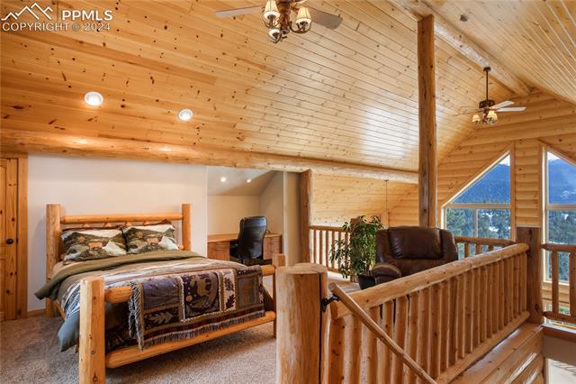 156 Paradiso Road Divide, CO 80814 - Photo 22 of 45 Lofted upper level Bedroom w/ 2 large walk-in closets